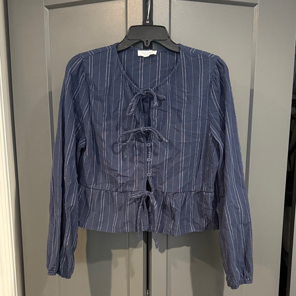 Elegant Navy Striped Blouse with Bow Details